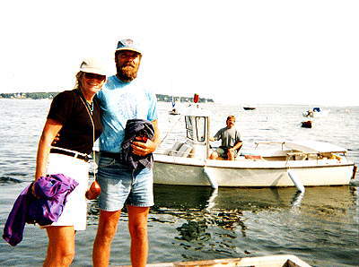 happy campers on dock with steve in lobster boat