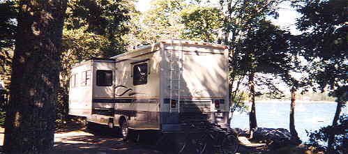 Gray Homestead rv site with woods and ocean
