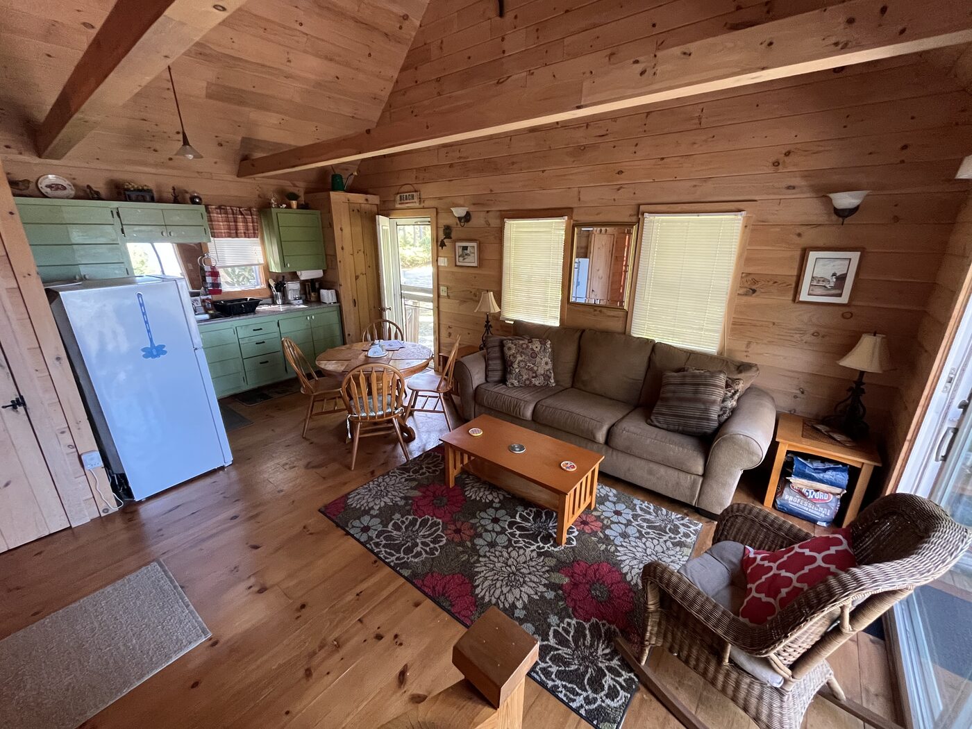 Living and dining area inside Outer Heron Cottage